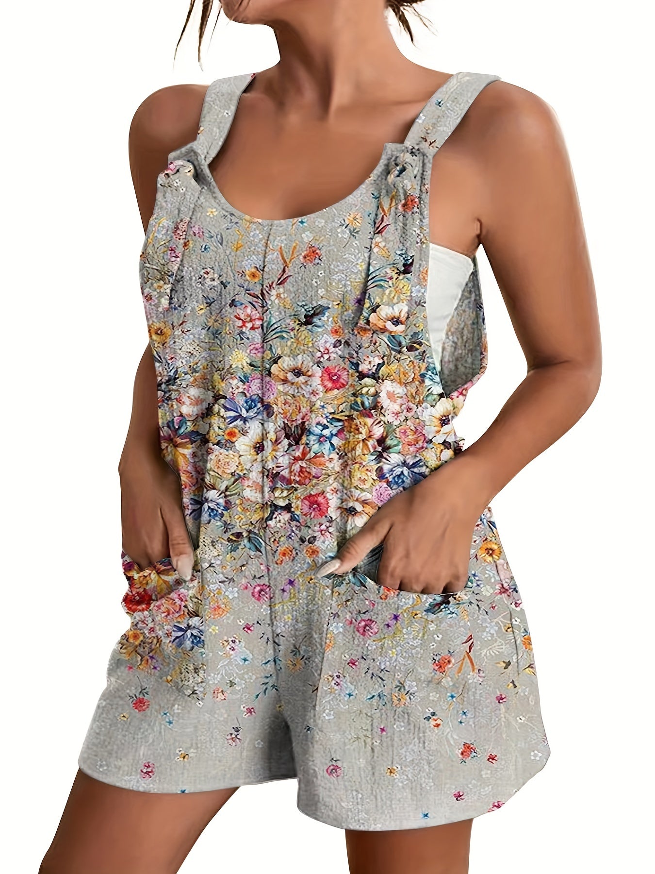 Zara - Blumiges Sommer-Playsuit mit Taschen und Rüschendetails